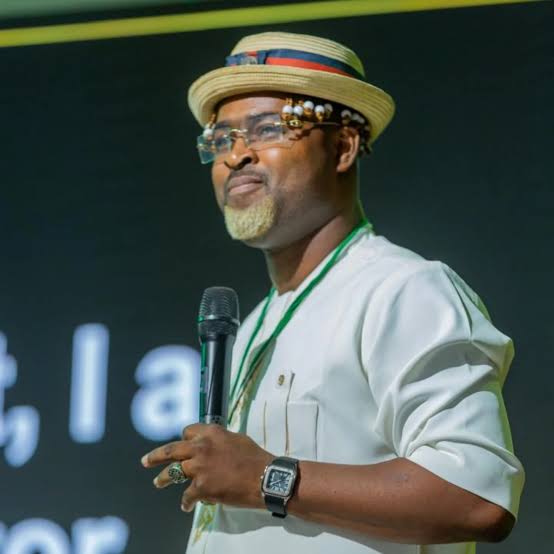 Coach Spark Ovadje speaking at a real estate summit